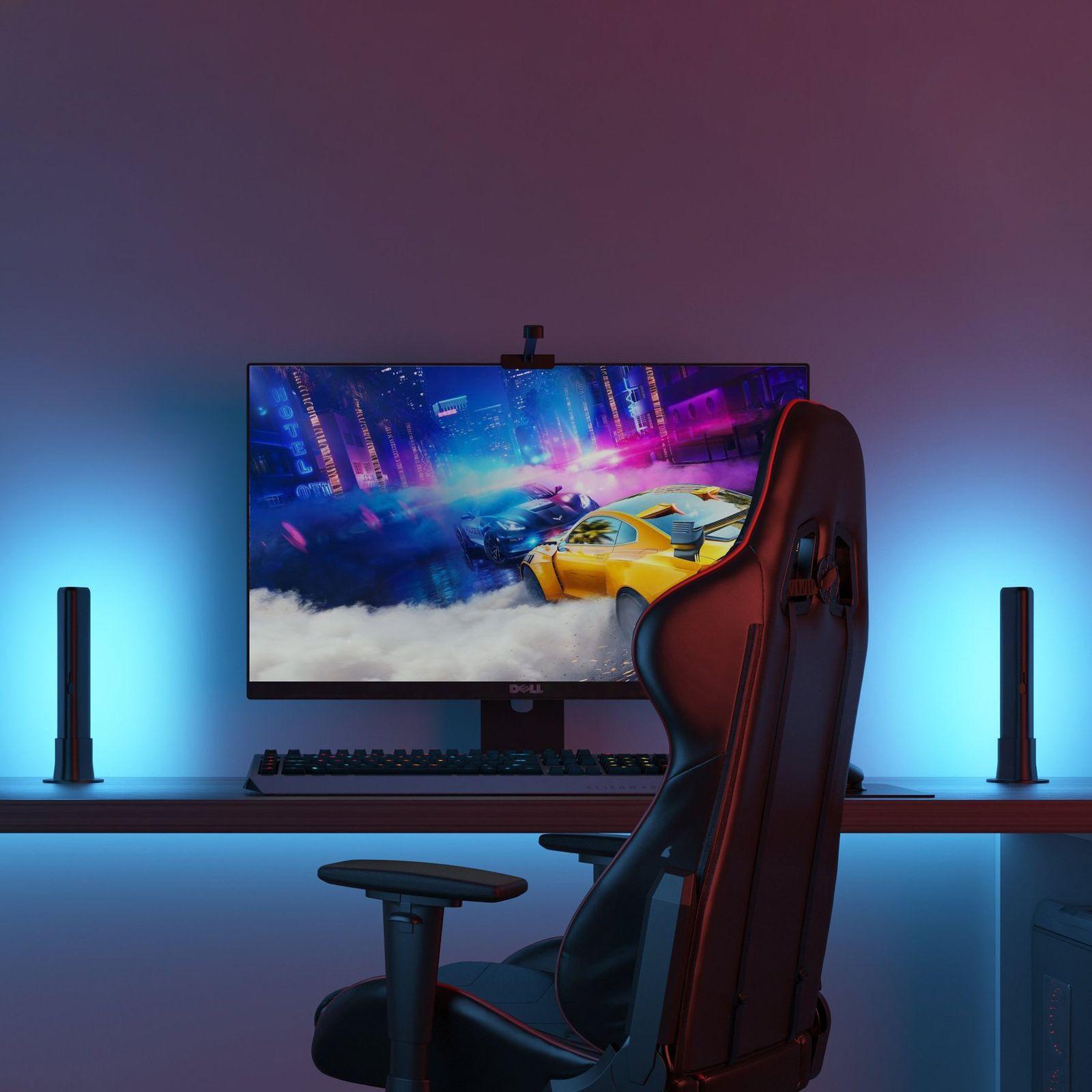Monitor ambient light setup with desk and wall glow